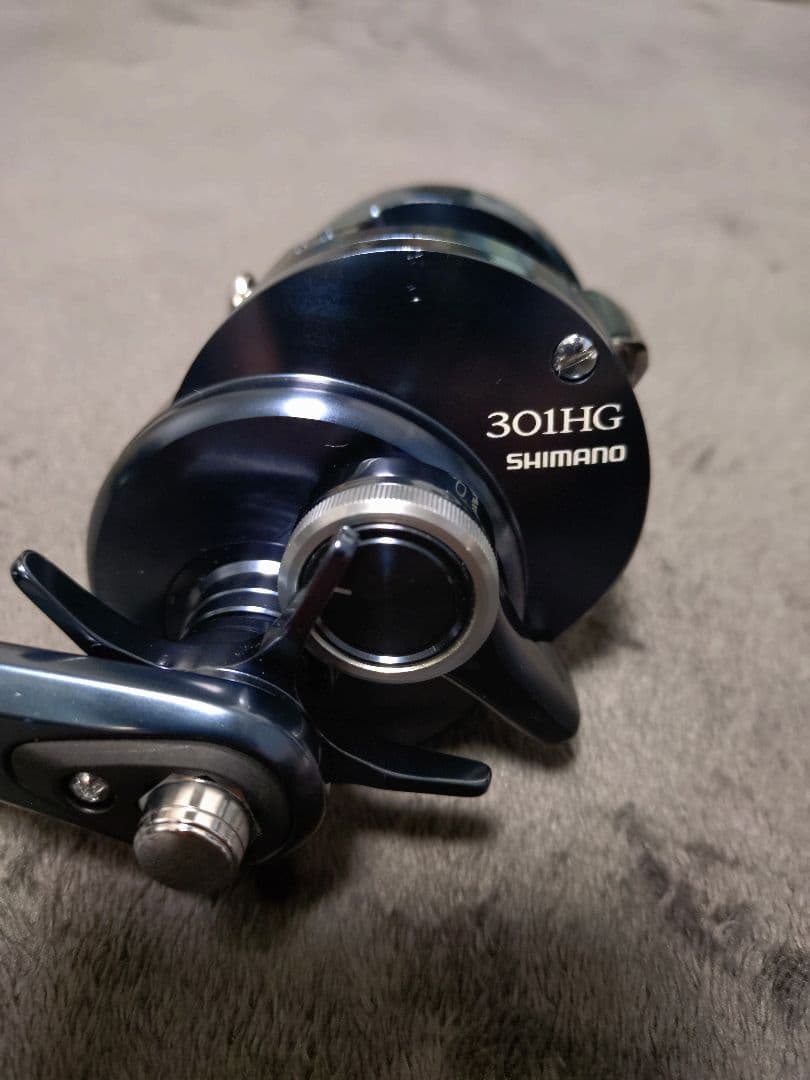 【極美品・完備品】シマノ オシアコンクエスト リミテッド 301HG（左）