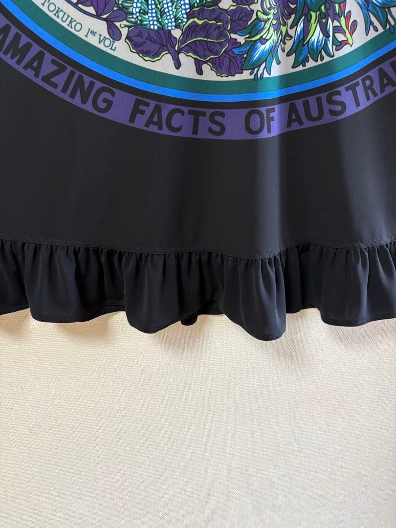 『未使用に近い』⭐️トクコプルミエヴォル⭐️黒地に前中央に丸いお花の柄チュニック❣️