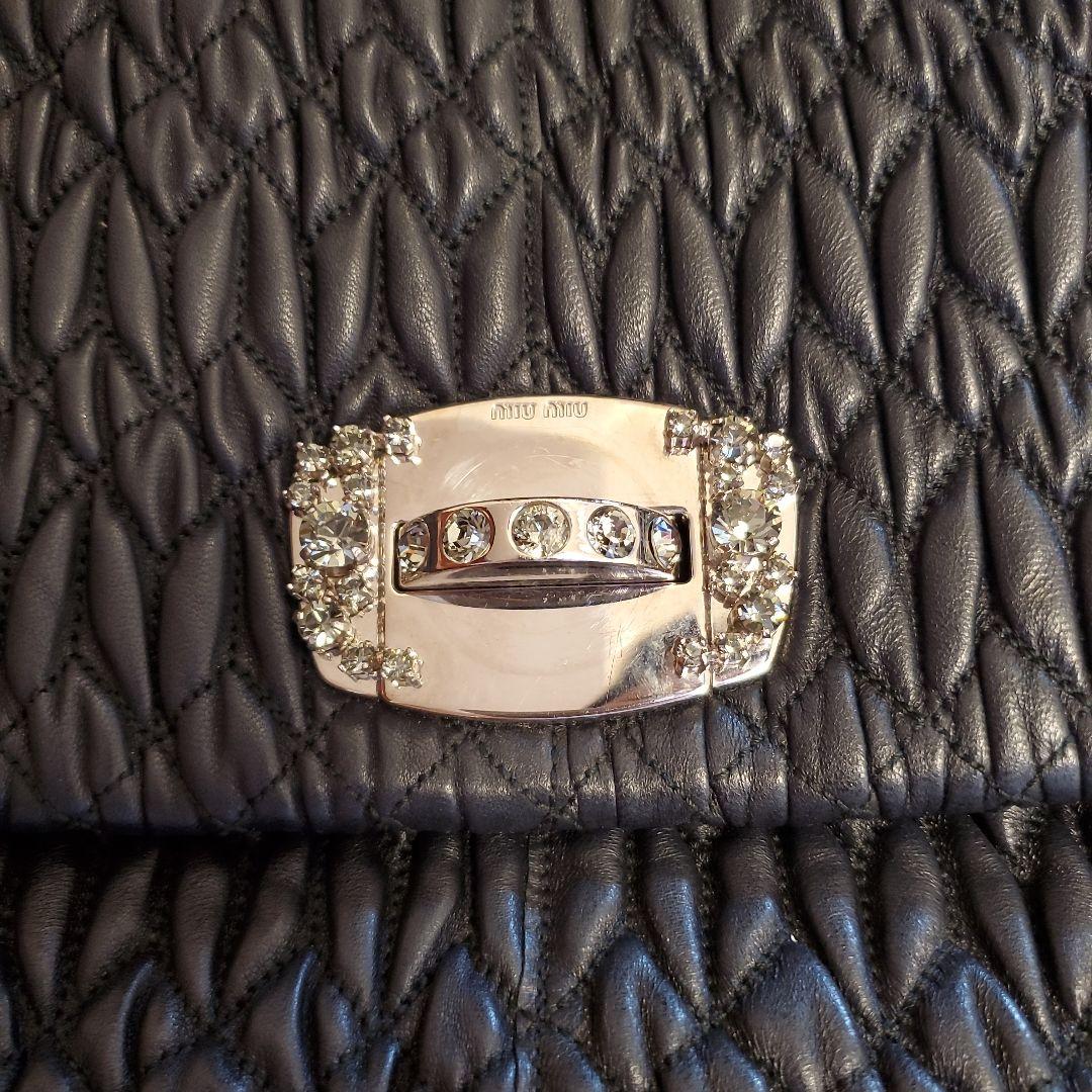 POPOmiu miu ブラック マテラッセ　ナッパ　クリスタル　クラッチ