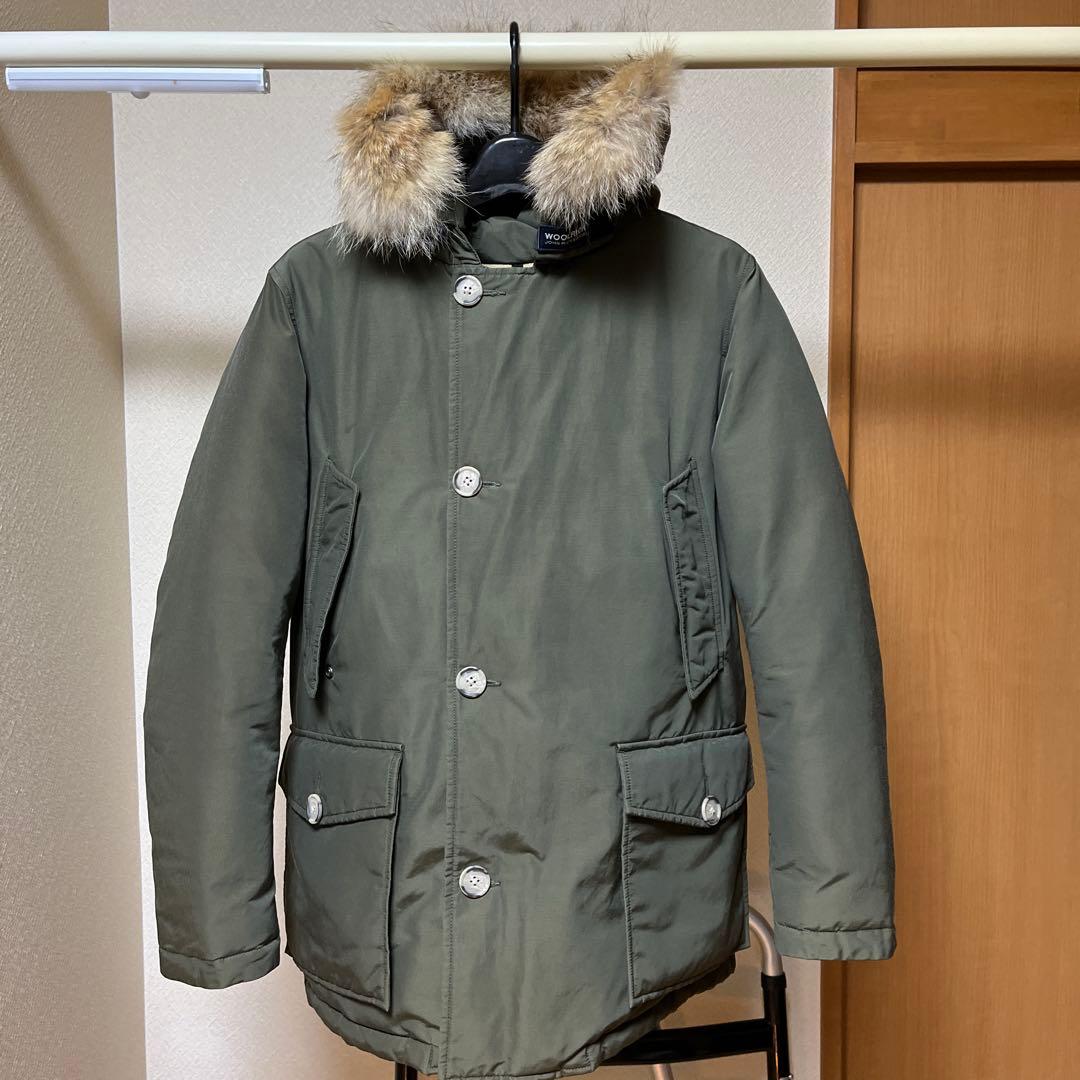 1/31まで。WOOLRICH オリーブ アークティックパーカー