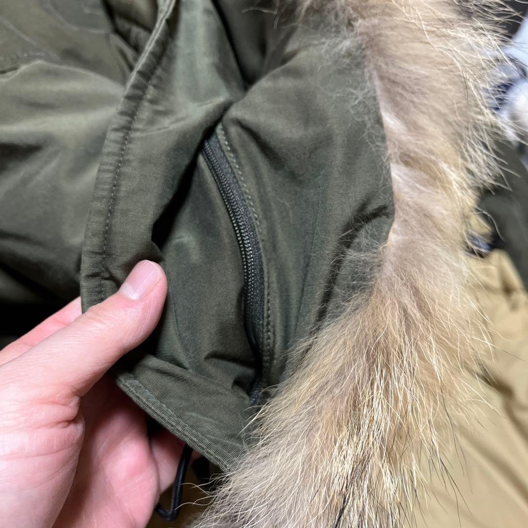 1/31まで。WOOLRICH オリーブ アークティックパーカー
