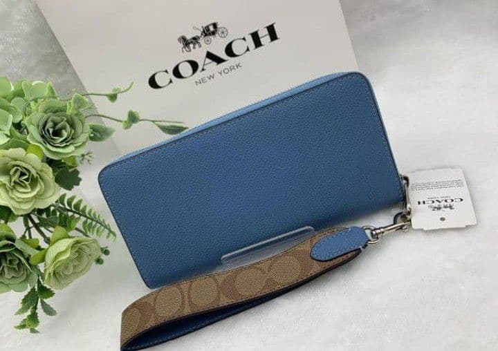 新品未使用コーチ長財布ブルーロングジップストラップ付レディースメンズ送料無料