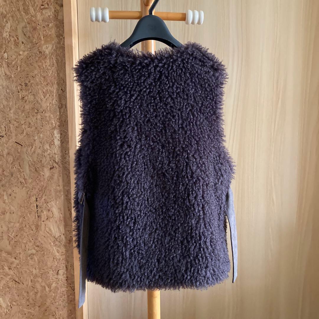 【douce Harmonie】フェイクファーベスト 両脇バックル調整可能