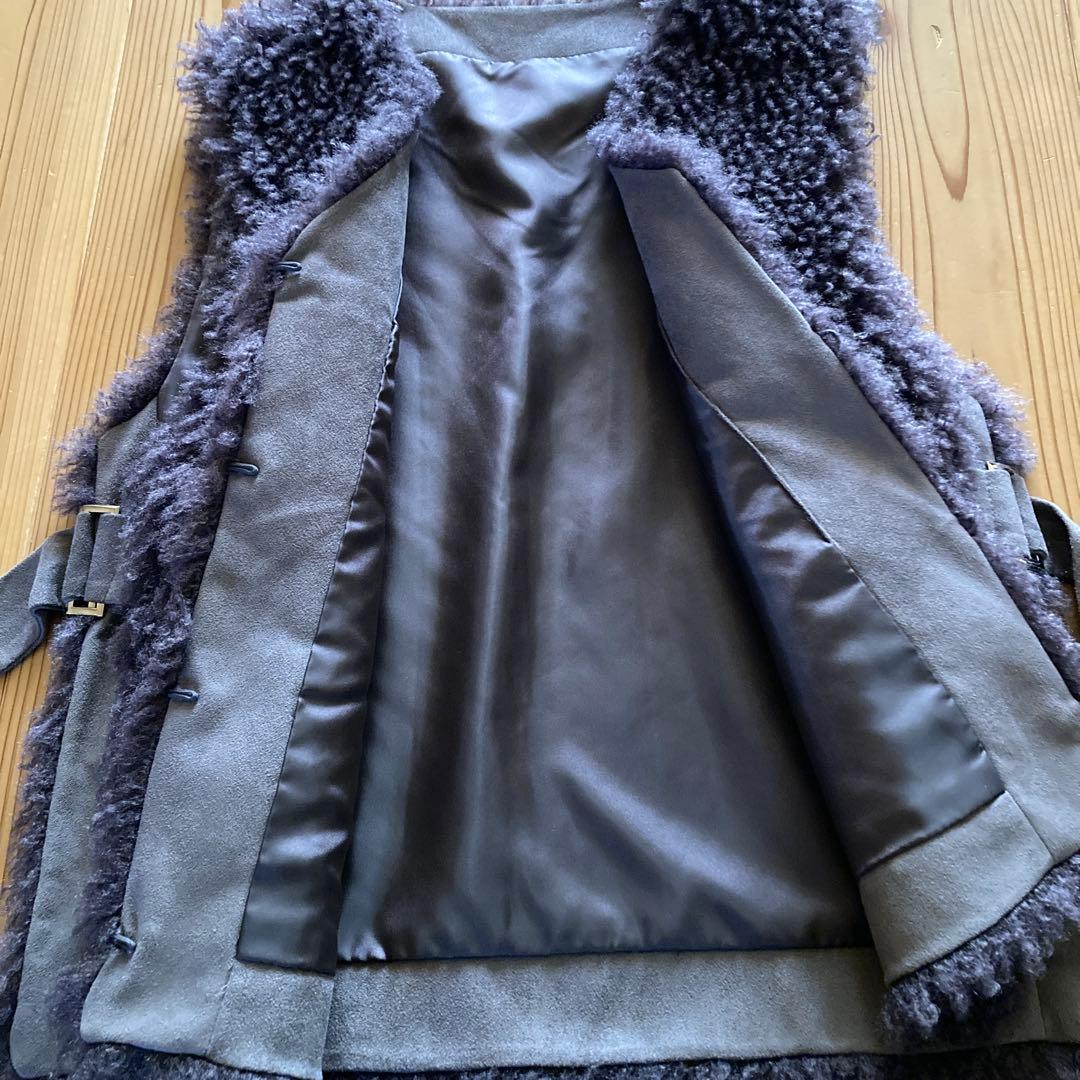 【douce Harmonie】フェイクファーベスト 両脇バックル調整可能