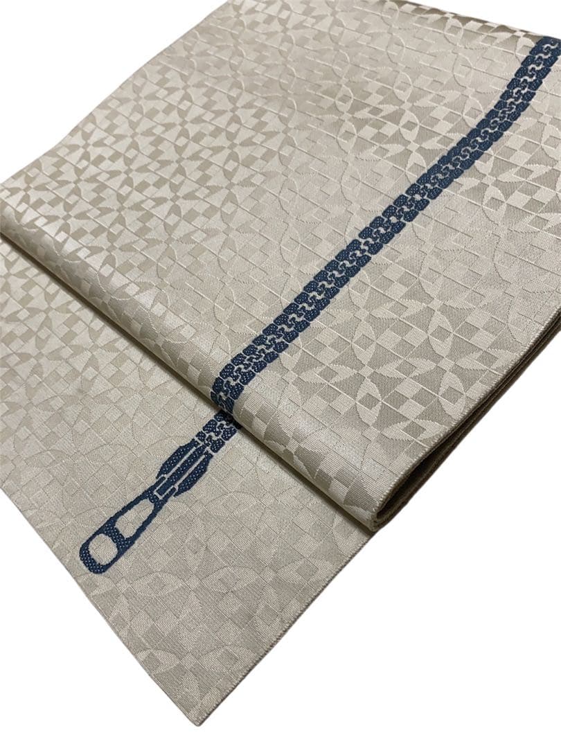 ¨̮⃝ 幾何学模様 ジッパー 博多織 名古屋帯