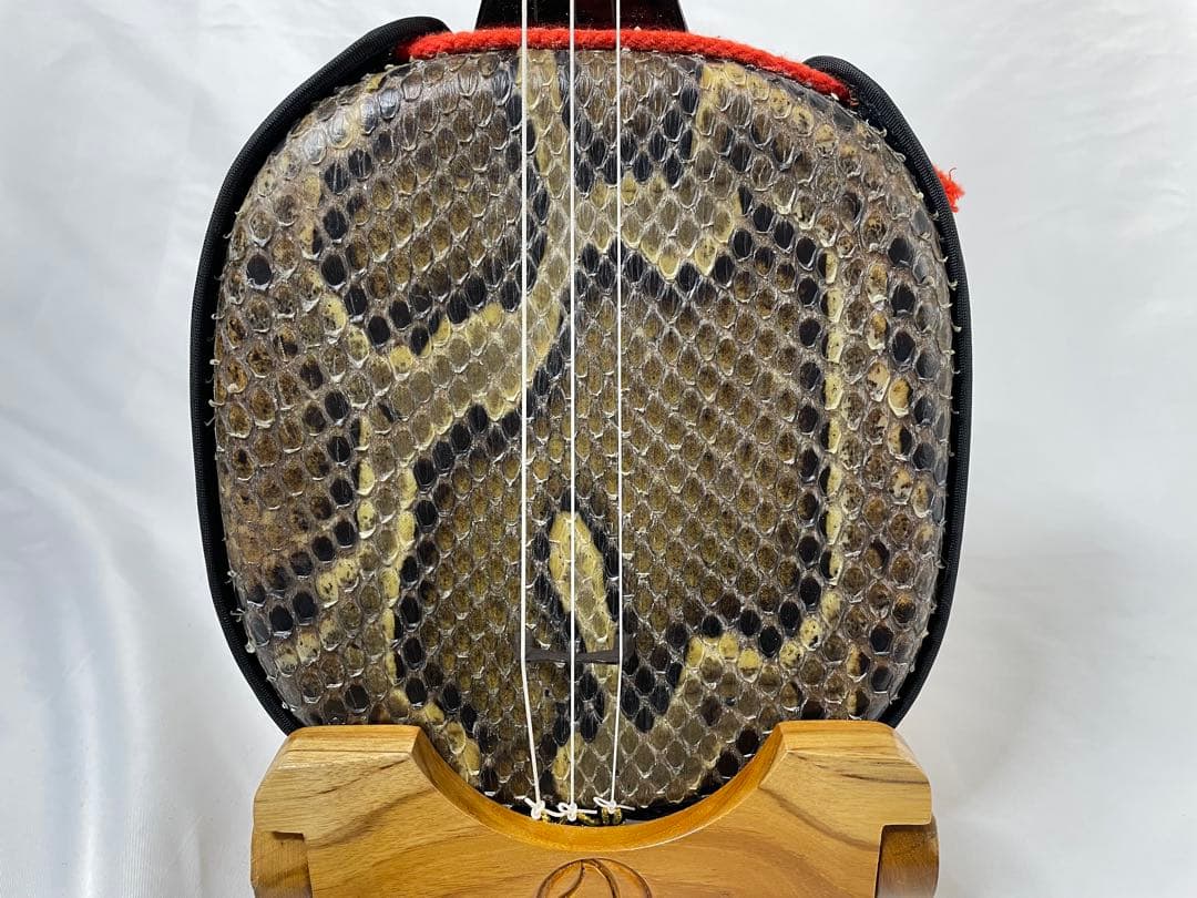 縞黒檀/カマゴン棹 強化張り・蛇皮三線