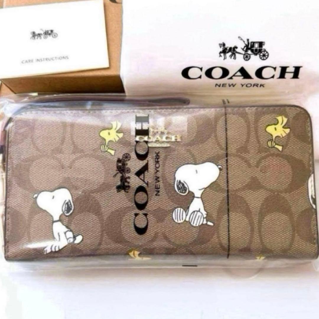 ✨新品未使用✨COACH スヌーピー　シグネチャー柄　長財布　保存袋