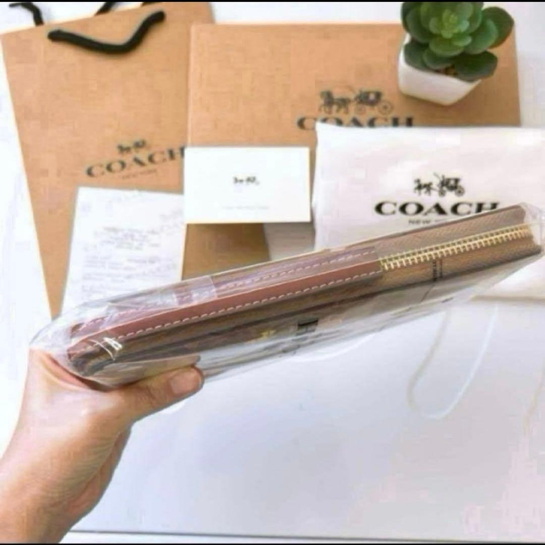 ✨新品未使用✨COACH スヌーピー　シグネチャー柄　長財布　保存袋