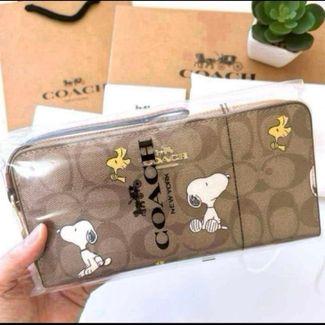 ✨新品未使用✨COACH スヌーピー　シグネチャー柄　長財布　保存袋