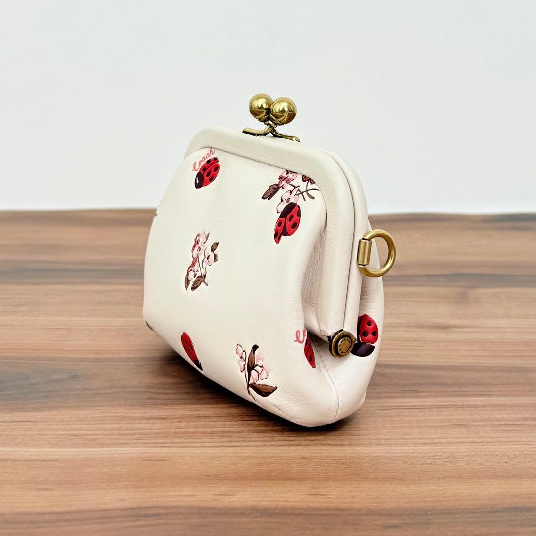 【美品】COACHコーチ がま口 ノラキスロック ケース レディバグ 財布