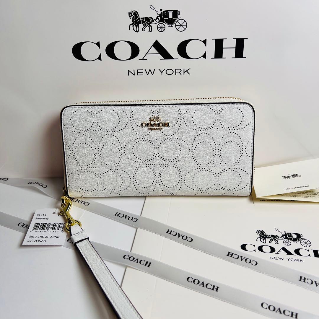 新品未使用COACHコーチ長財布 ホワイト パンチングロゴ ストラップ付 ギフト
