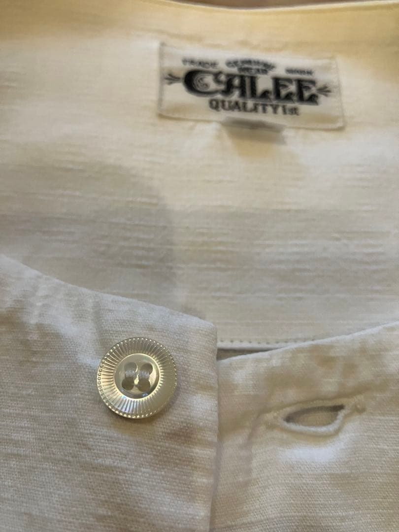 calee キャリー　ノーカラーシャツ　ホワイト　美品　S