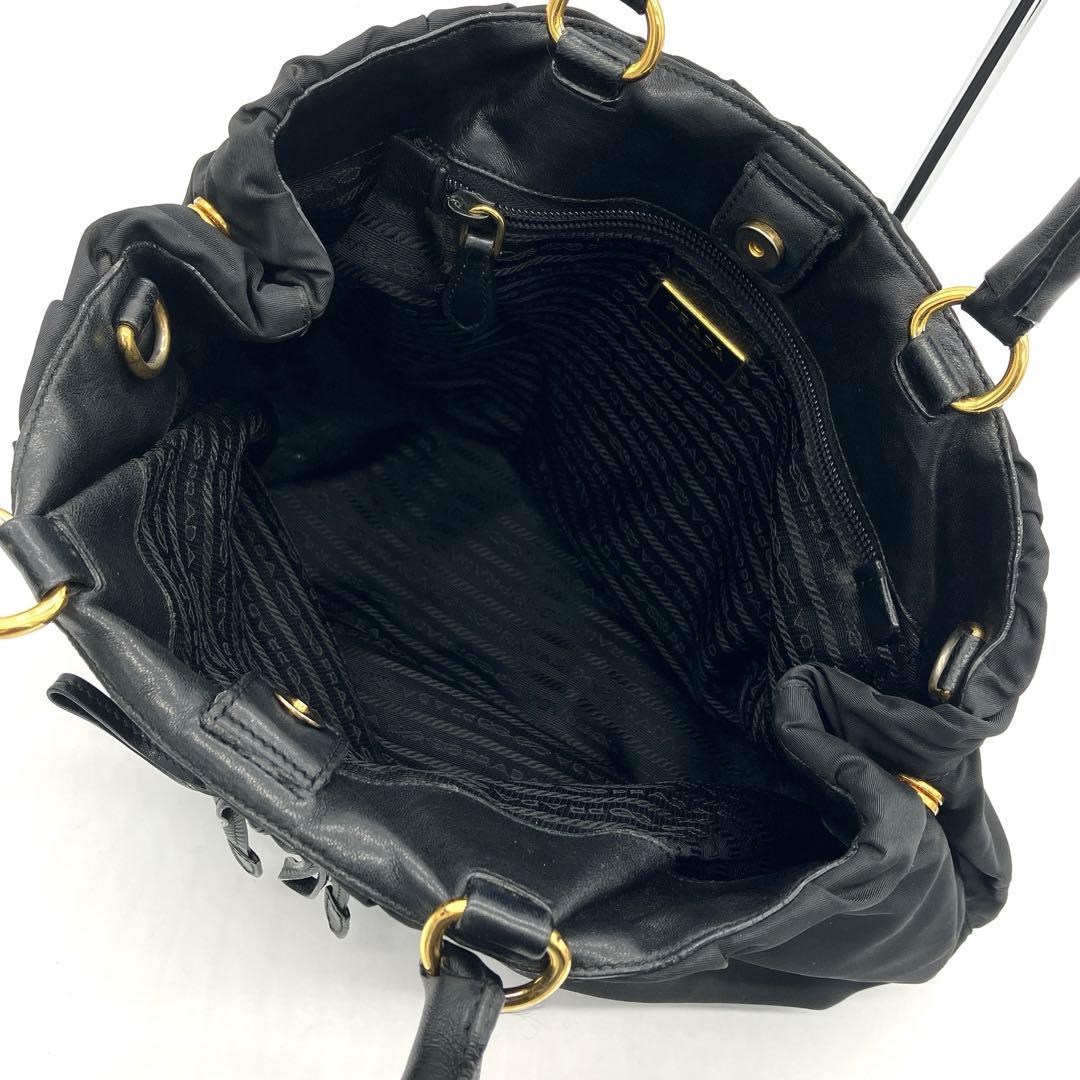【PRADA】ハンドバッグ　リボン　ロゴ金具　ゴールド金具　ナイロン　ブラック