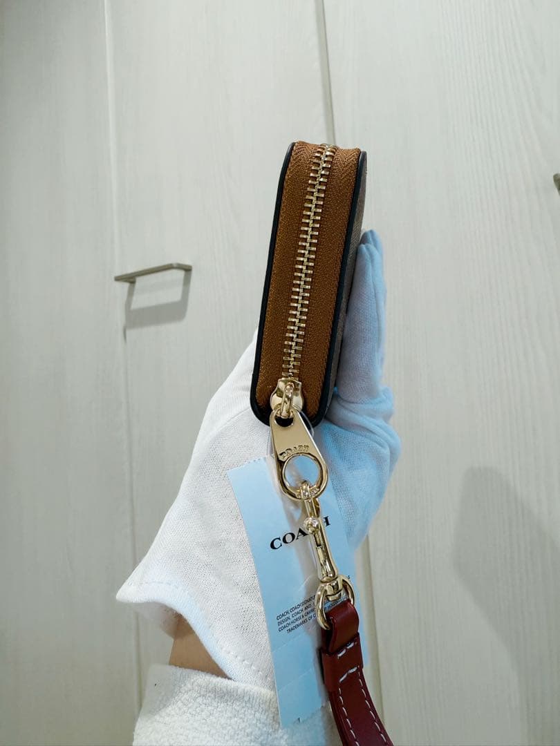 COACH スヌーピー柄 長財布