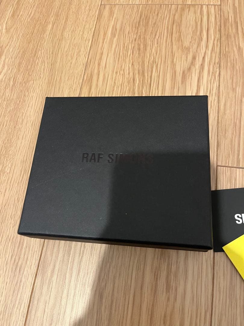 ラフシモンズ　スマイル　スマイリー　キーホルダー　新品未使用