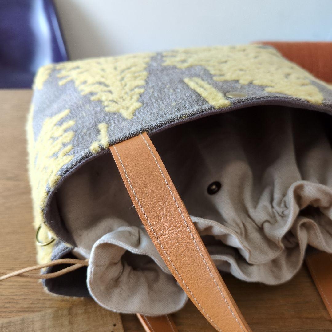 【1575】あおりポケットの巾着バッグ＊ミナペルホネン