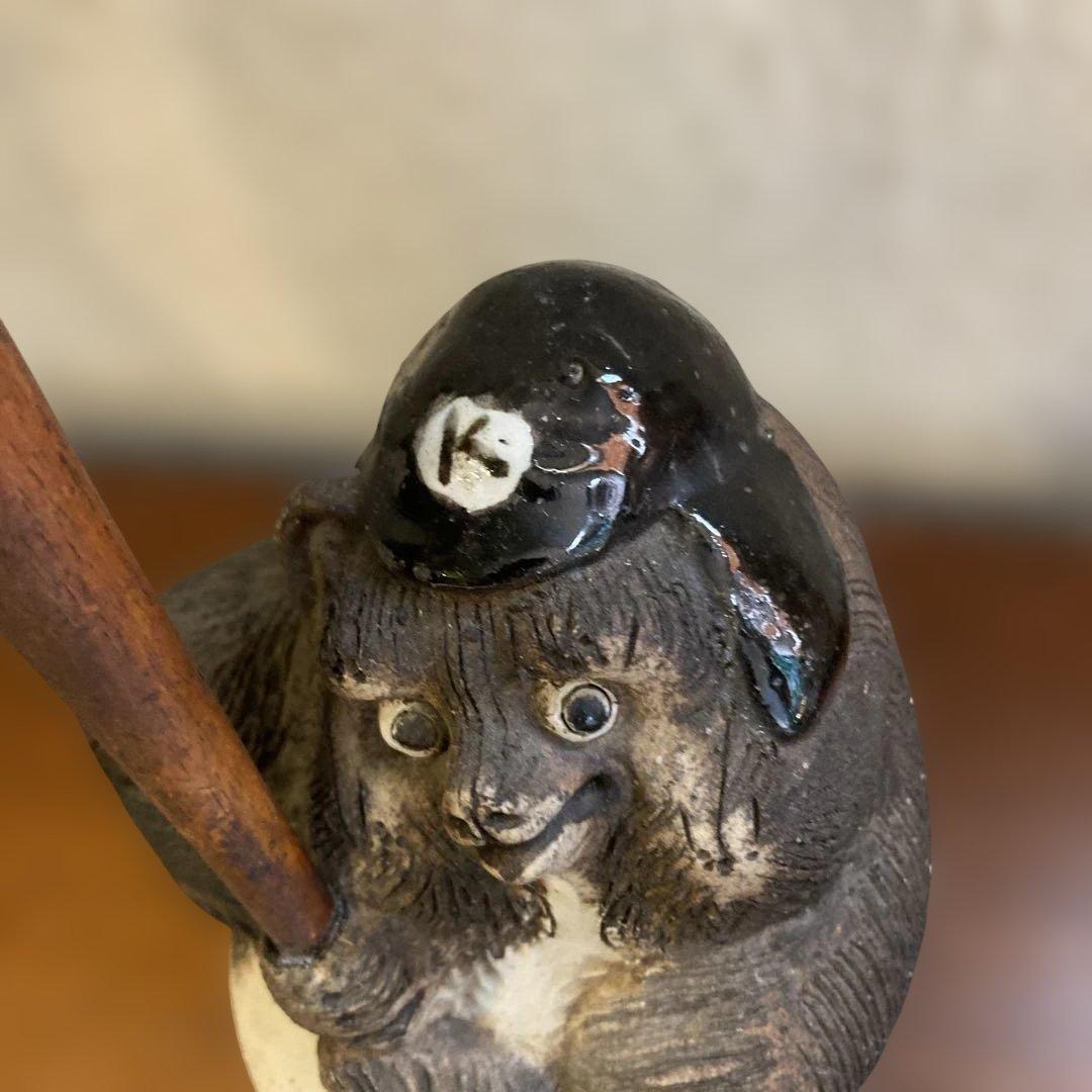 名門　狸庵の珍しいバットを持ったキュートなお目目のタヌキ君の置物です。