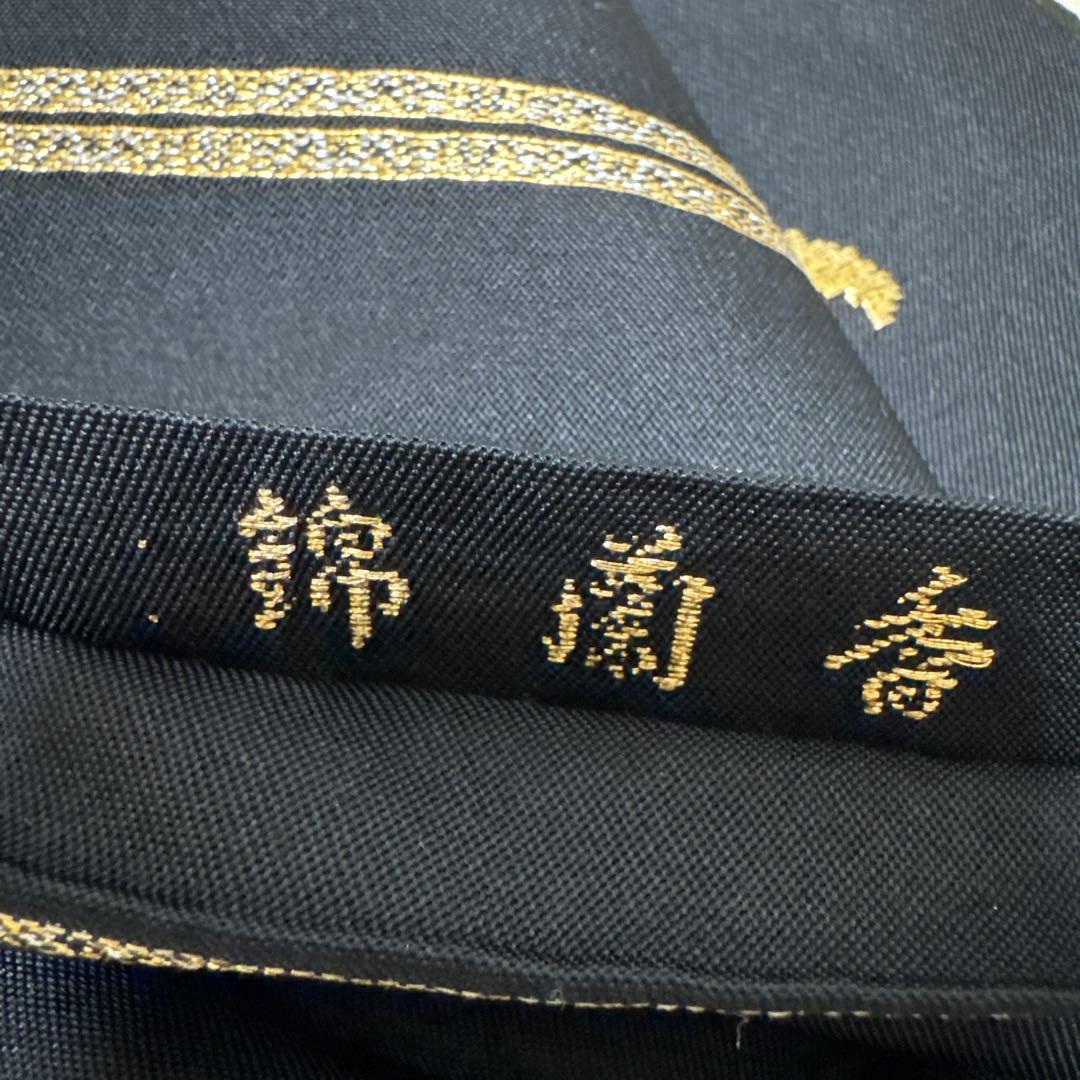 龍村平蔵製　本袋帯　黒地　金銀糸　秀繭錦