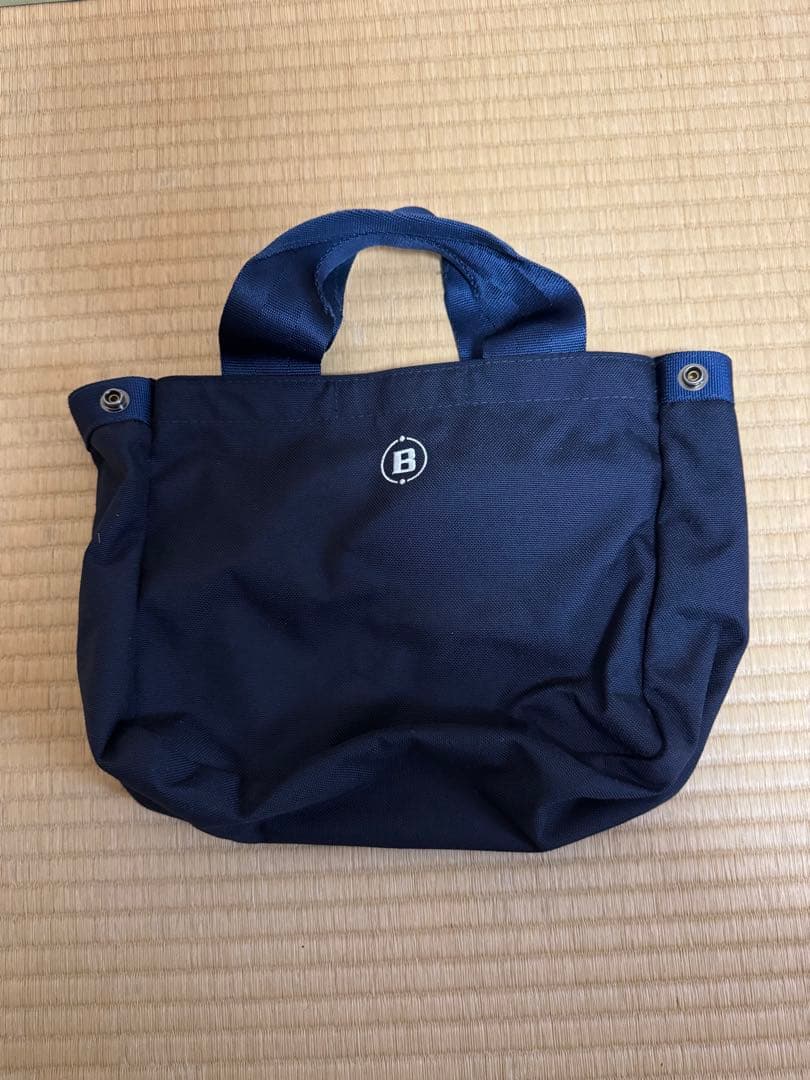 BRIEFING ネイビー ラウンドバッグ