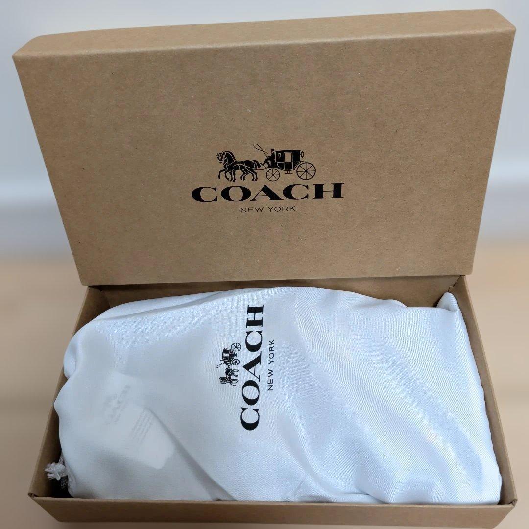 新品 COACH コーチ ロボット柄 ラウンドファスナー 長財布