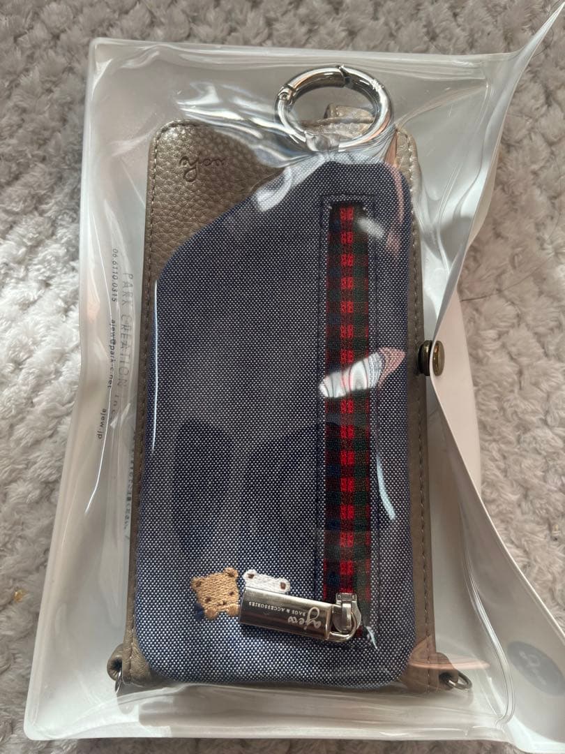 ファミリア ajew スマホケース マルチ対応サイズM