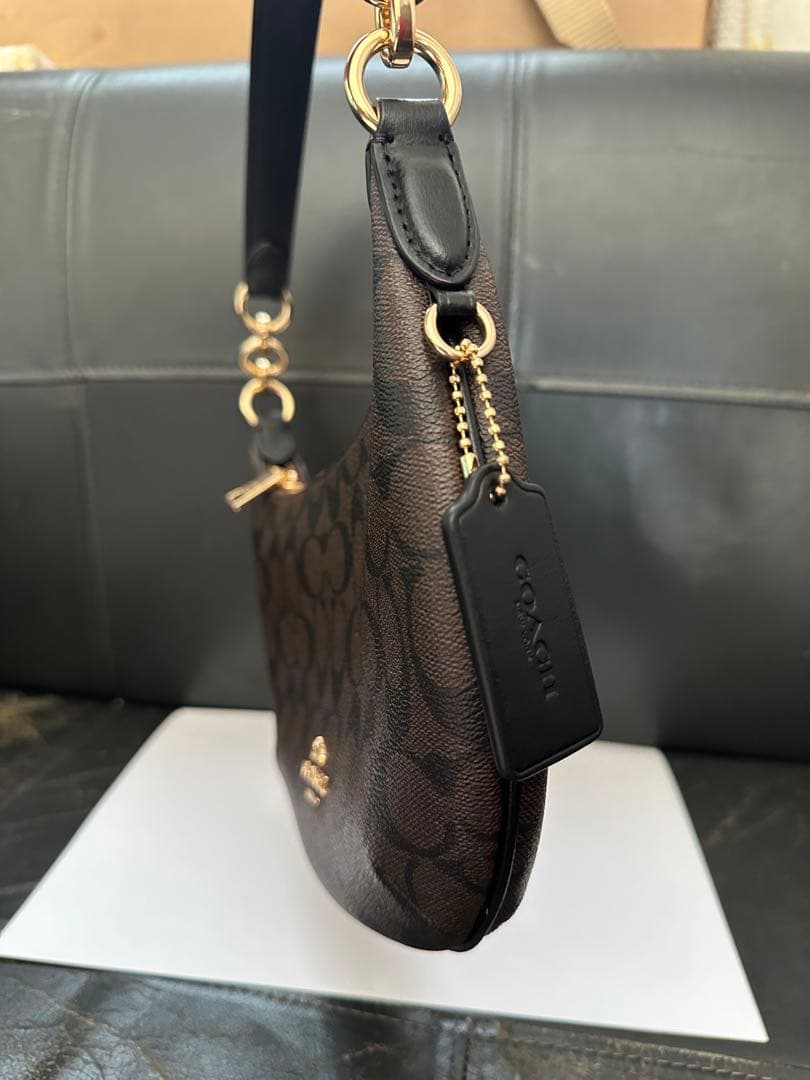 COACH ロゴ入りブラウンバッグ