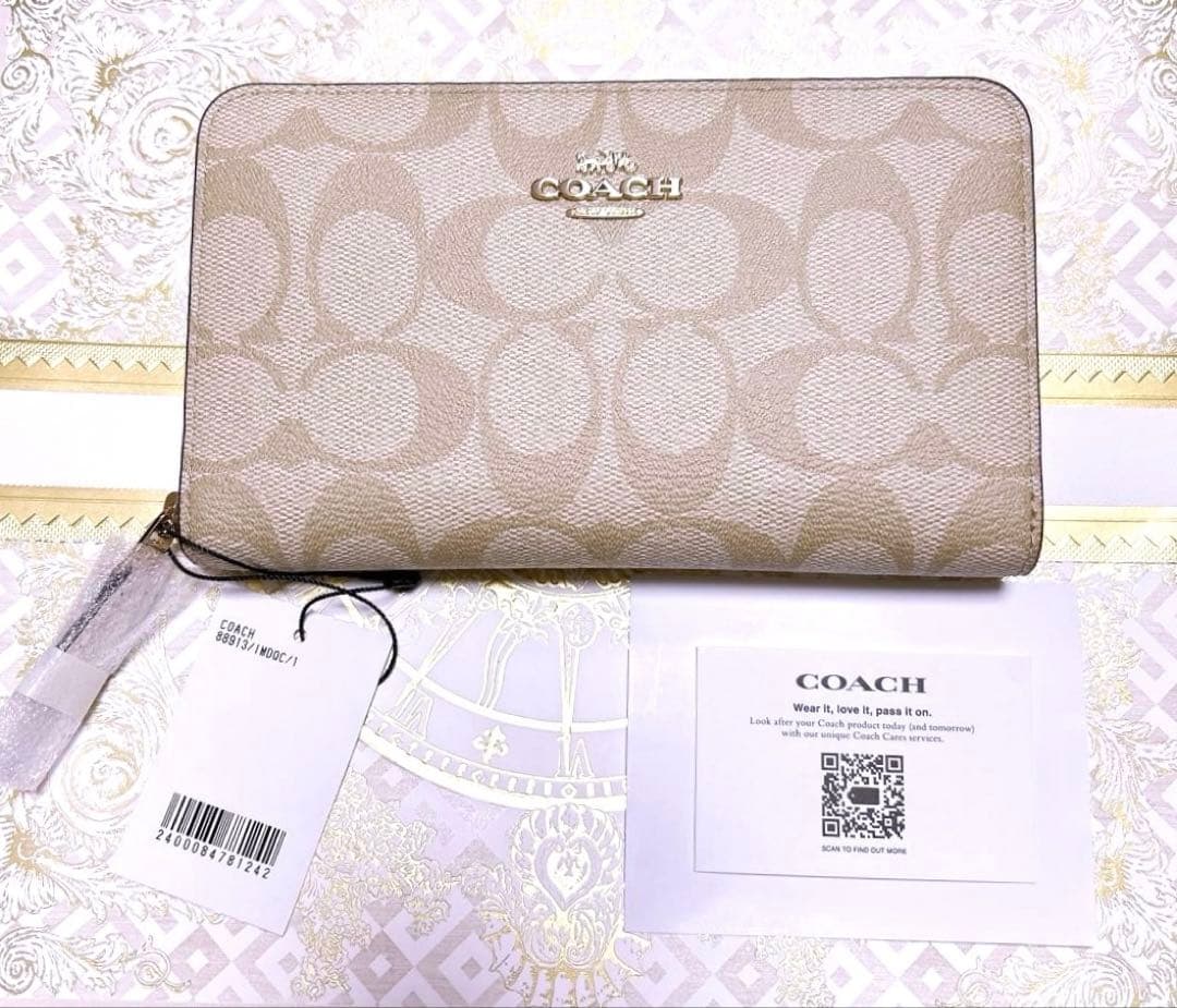 COACH シグネチャー ラウンドジップ 長財布 PVCコーティング