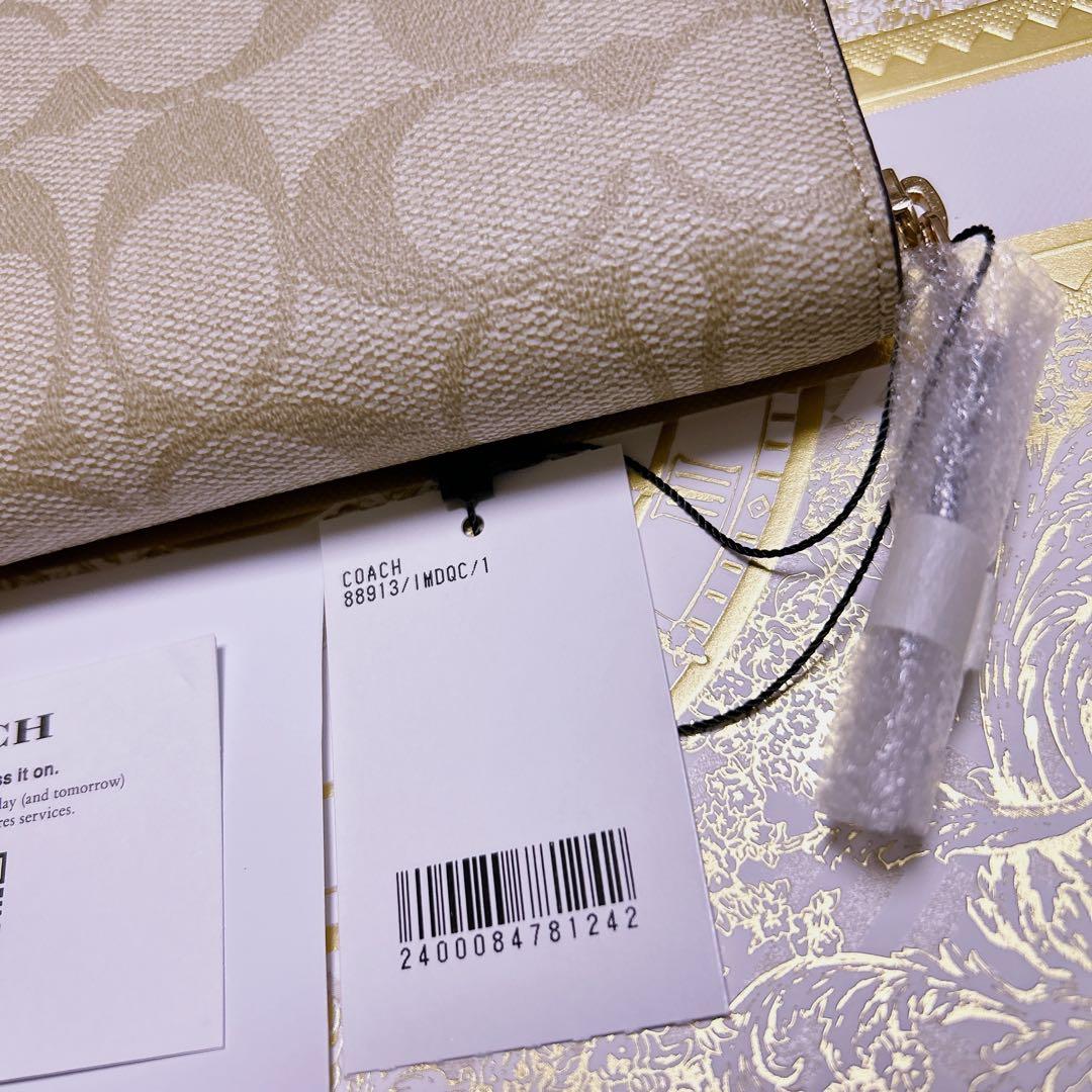COACH シグネチャー ラウンドジップ 長財布 PVCコーティング