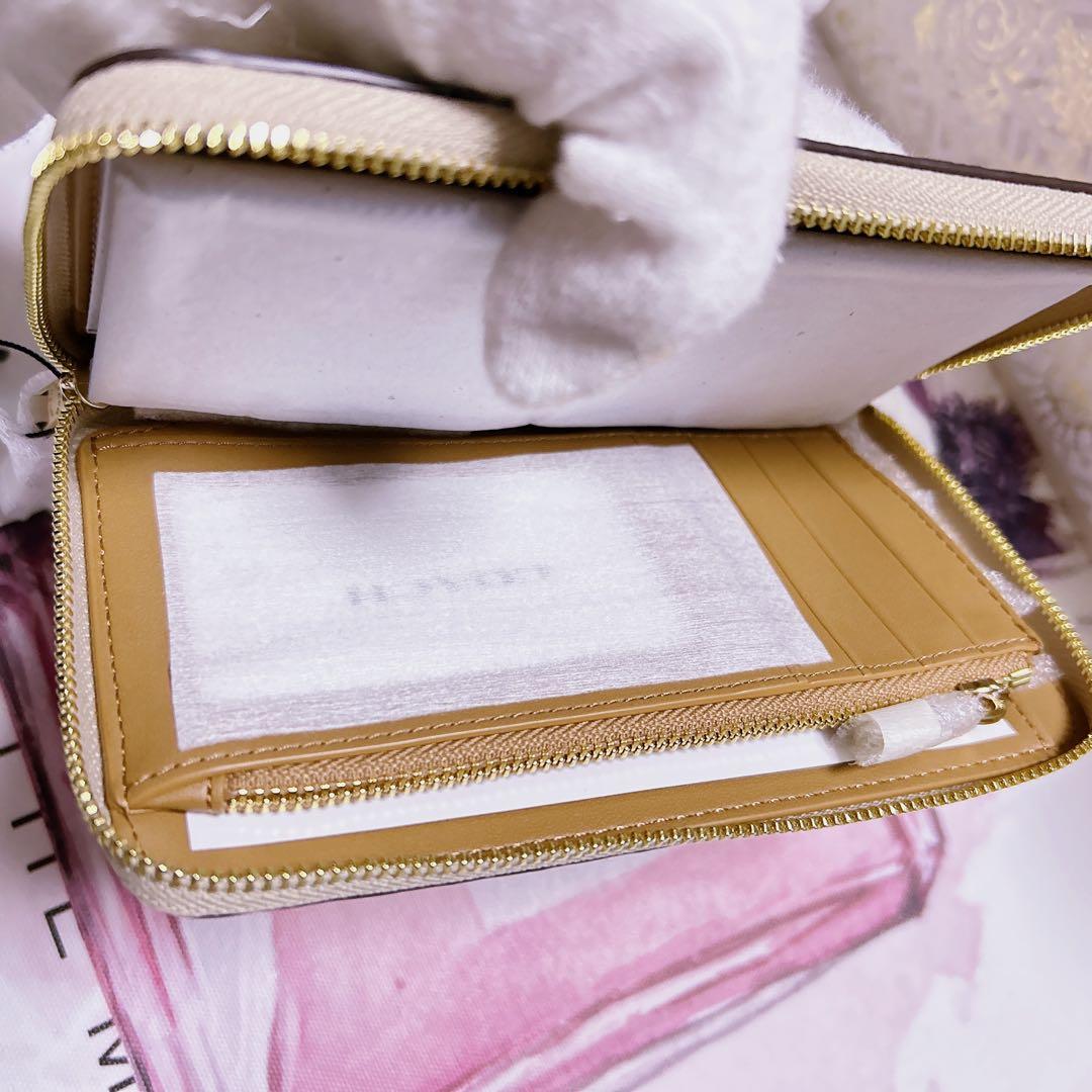 COACH シグネチャー ラウンドジップ 長財布 PVCコーティング