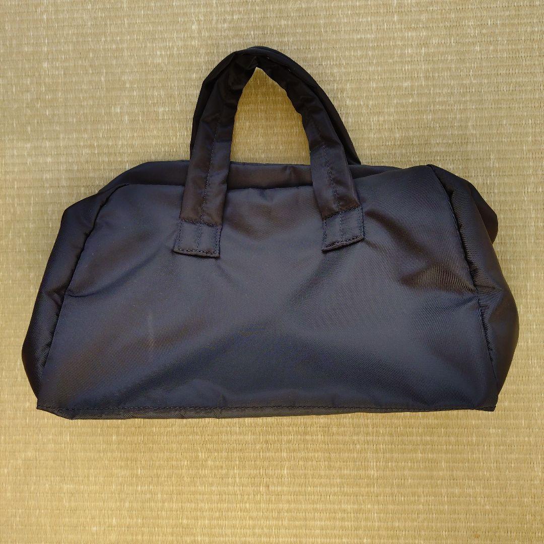 コムデギャルソン　黒のナイロンバッグ