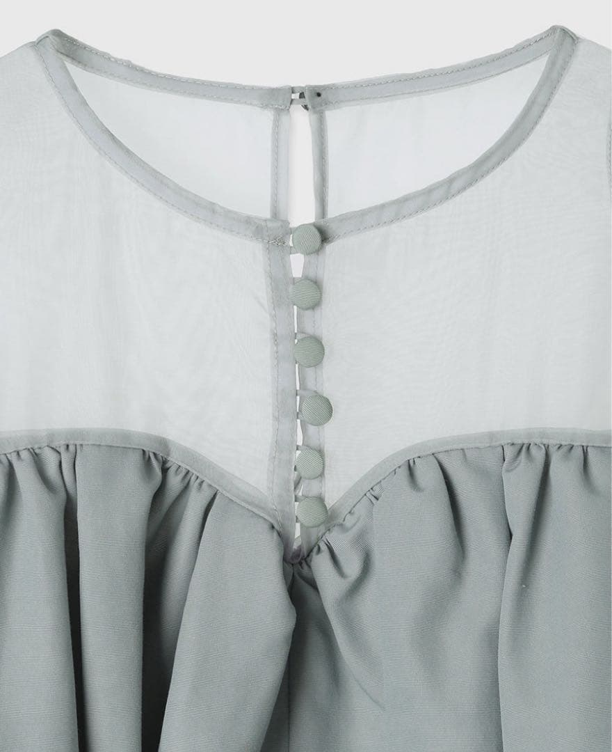 アニュアンス　スプレッドフレアブラウス　グリーン