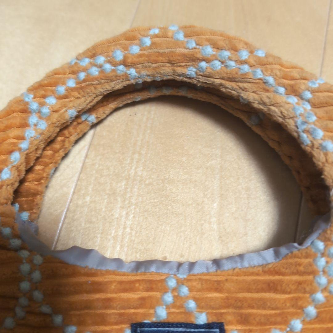 ミナペルホネン　タンバリン　オレンジ コーデュロイ エッグバッグ