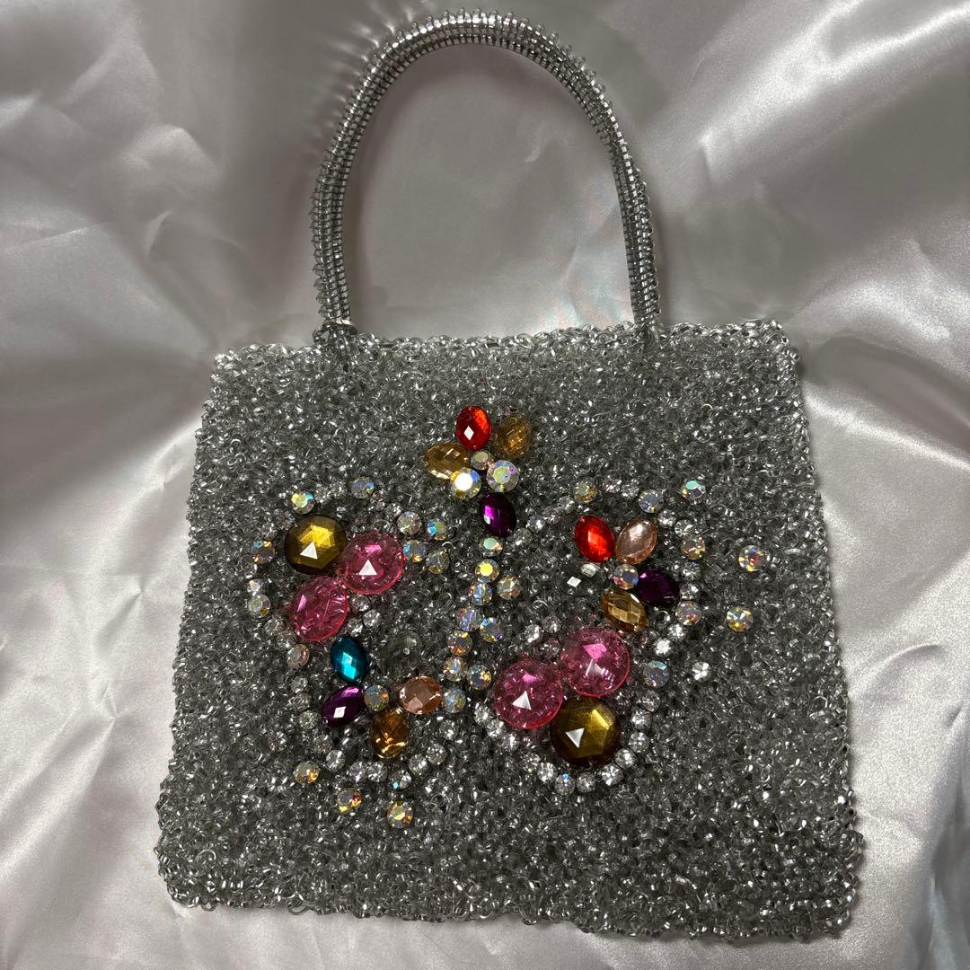 アンテプリマ ビジュー付きシルバーバッグ