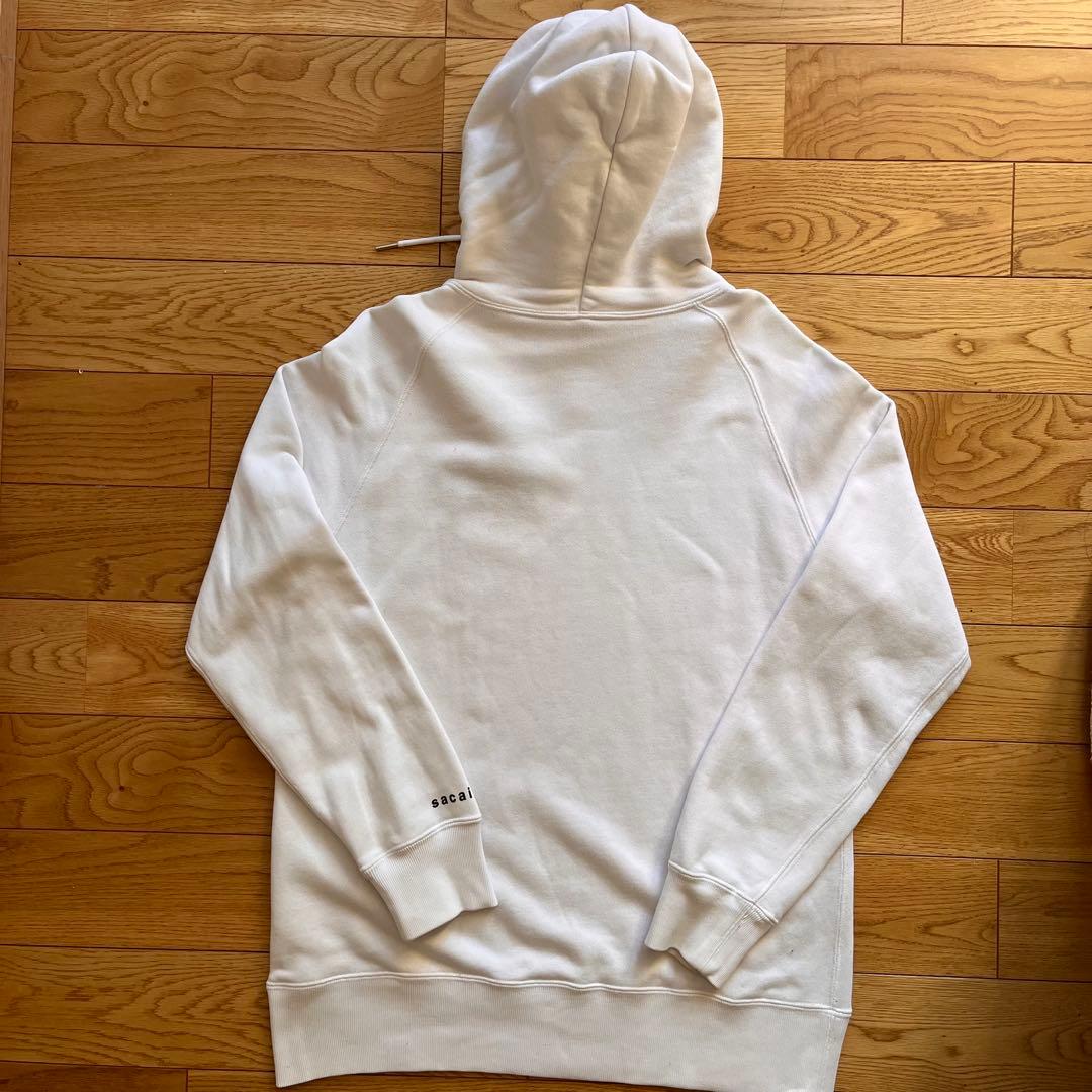 sacai × KAWS パーカー