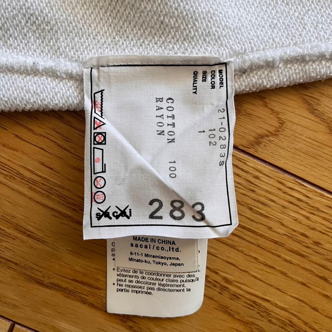 sacai × KAWS パーカー