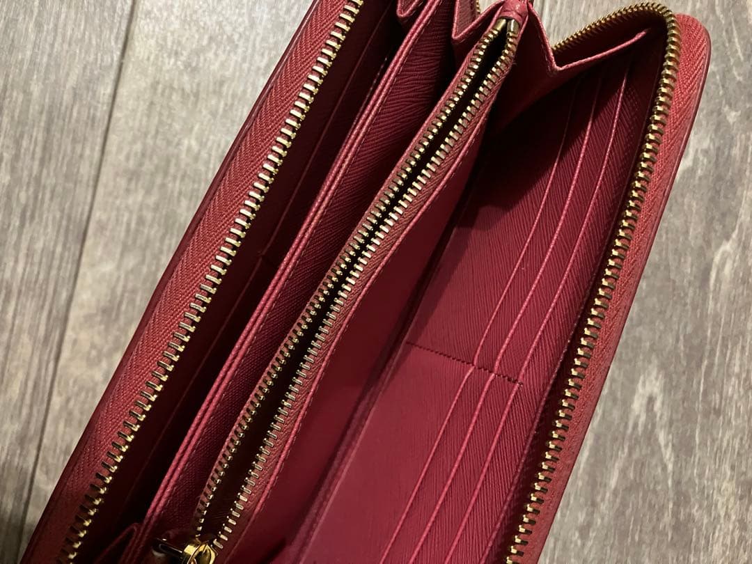 PRADA プラダ 長財布 ロゴ サフィアーノ レザー ラウンドジップ ピンク