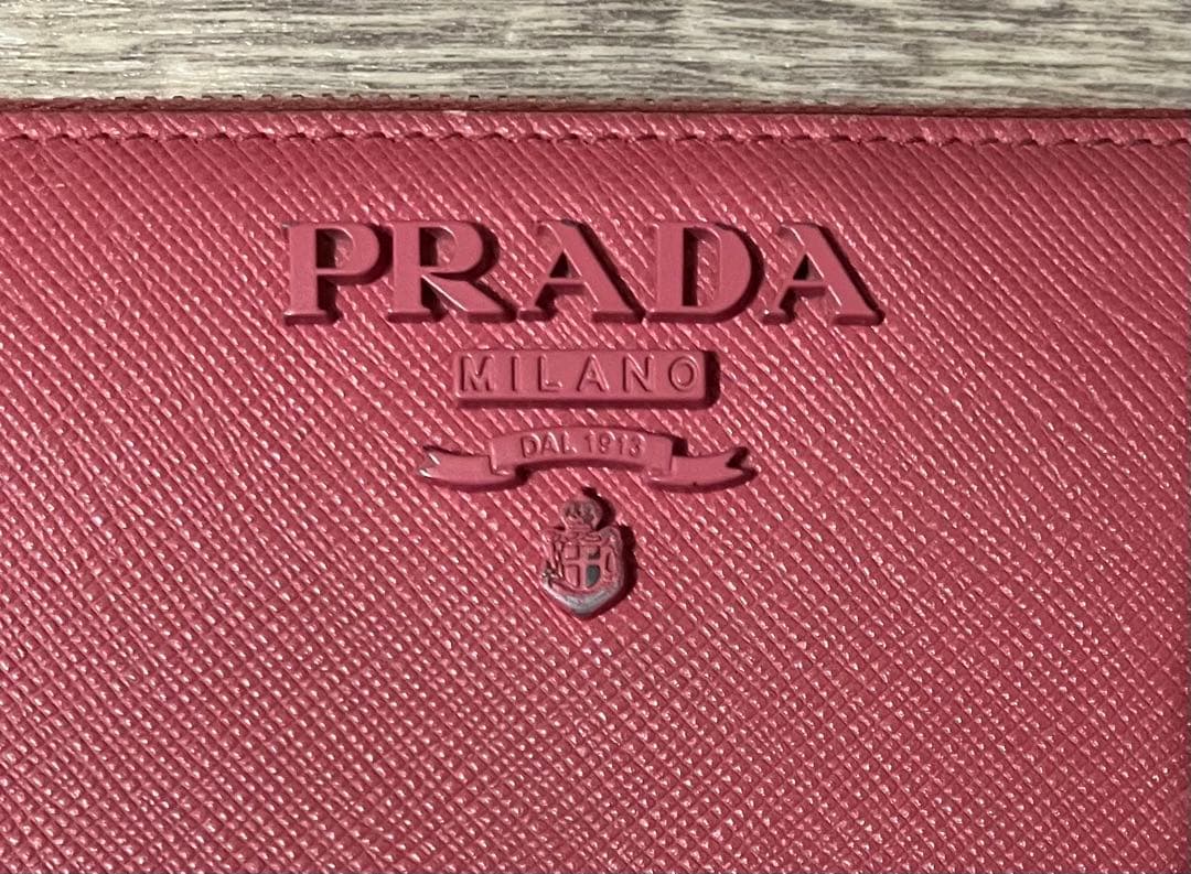 PRADA プラダ 長財布 ロゴ サフィアーノ レザー ラウンドジップ ピンク