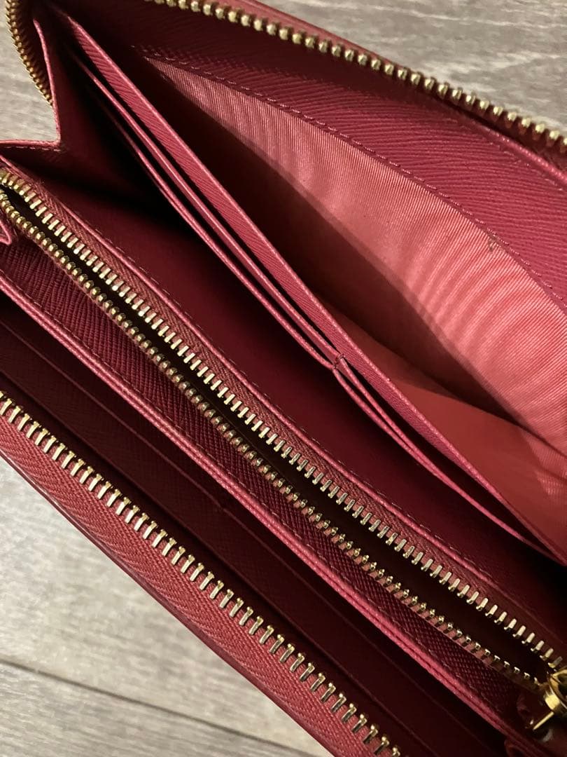 PRADA プラダ 長財布 ロゴ サフィアーノ レザー ラウンドジップ ピンク