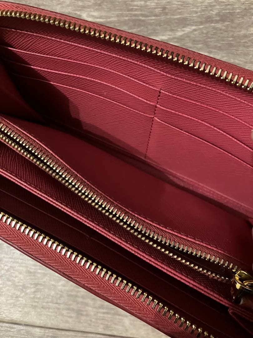 PRADA プラダ 長財布 ロゴ サフィアーノ レザー ラウンドジップ ピンク