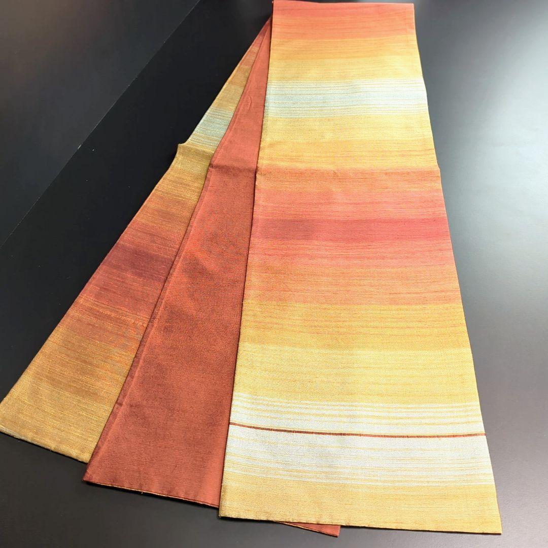 H-286 袋帯 正絹 全通 紬 グラデーション 赤 オレンジ 黄 白