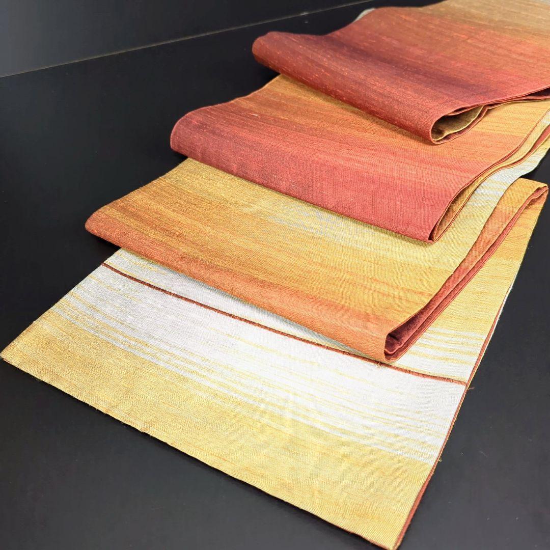 H-286 袋帯 正絹 全通 紬 グラデーション 赤 オレンジ 黄 白