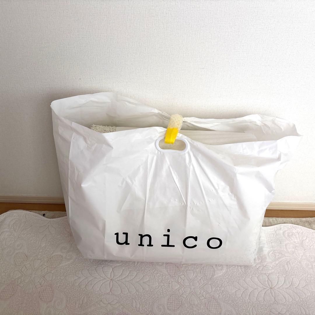 unico アイボリーラグ 抽象デザイン