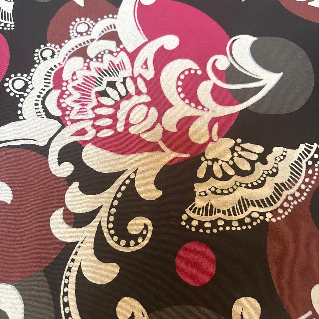 【美品】✨トクコプルミエヴォル✨黒地に抽象的な花柄の五分袖チュニック❣️