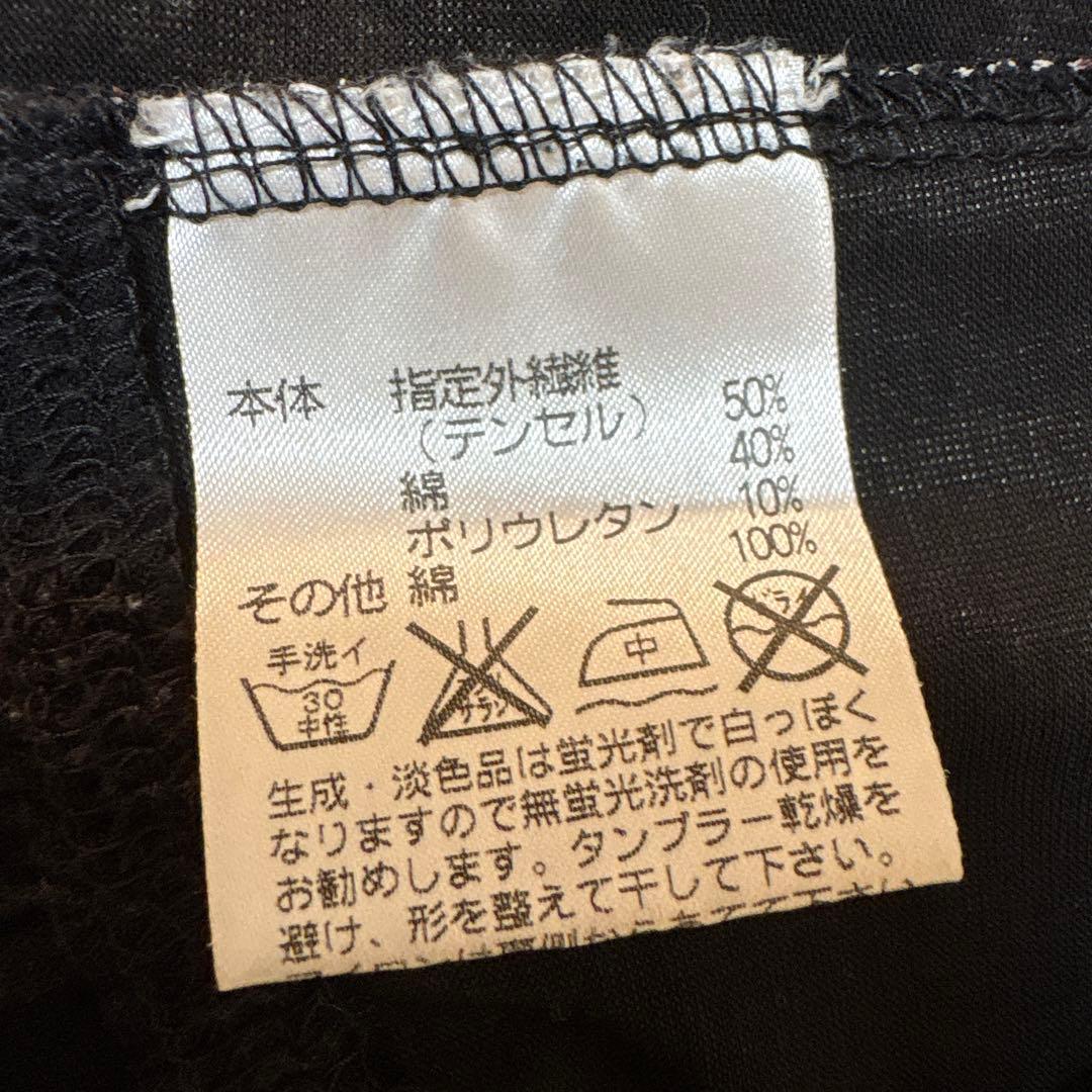 【美品】✨トクコプルミエヴォル✨黒地に抽象的な花柄の五分袖チュニック❣️