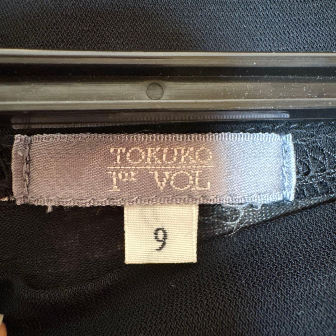 【美品】✨トクコプルミエヴォル✨黒地に抽象的な花柄の五分袖チュニック❣️