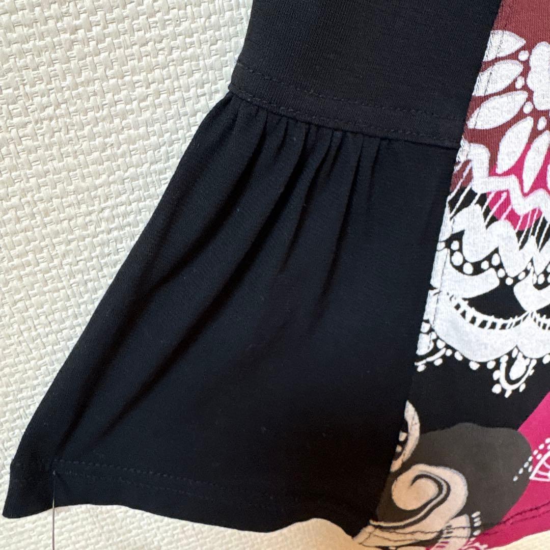 【美品】✨トクコプルミエヴォル✨黒地に抽象的な花柄の五分袖チュニック❣️