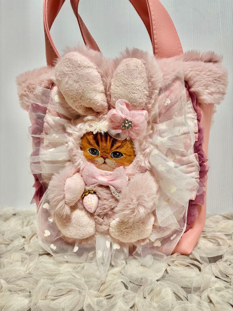 コヤンイサムチョン　フェイクレザーピンクのトートバッグ