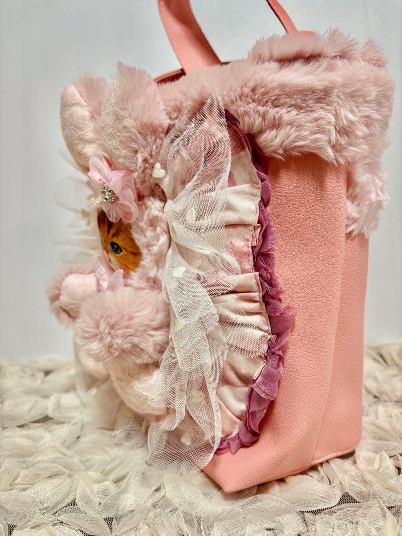 コヤンイサムチョン　フェイクレザーピンクのトートバッグ