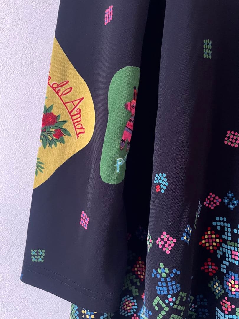 トクコプルミエブォル/カラフル幾何学模様の長袖Aラインチュニック(訳あり)