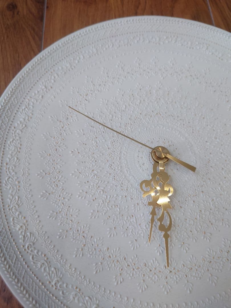 和田由記子さん　壁掛け時計